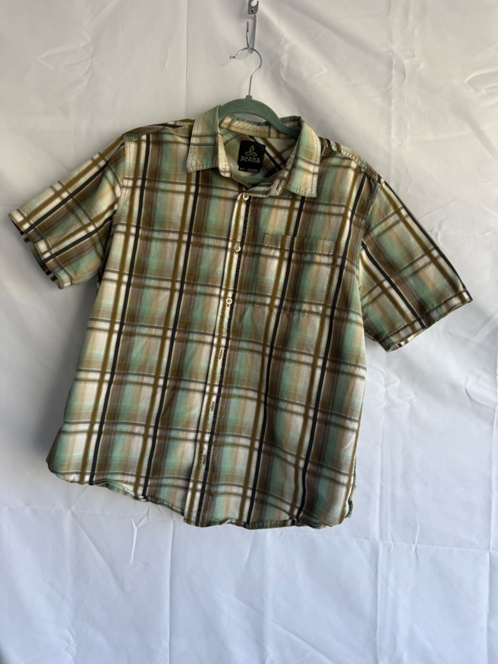 Prana short sleeved button down top, women size medium